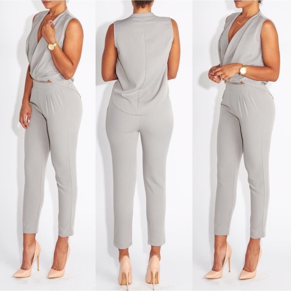 NWT, Jumpsuit with zipper detail at waist line. Size S